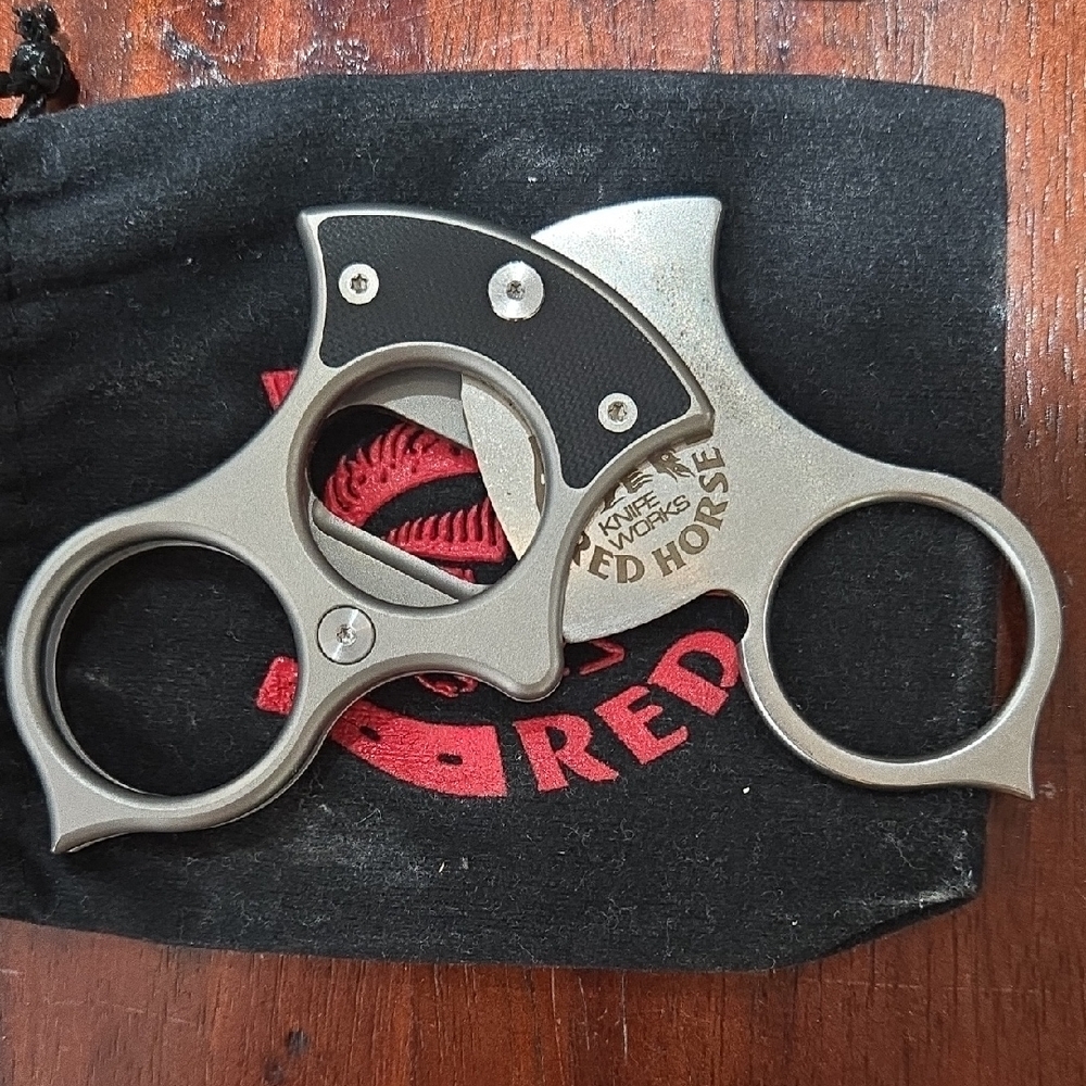Sleek Silver and Black Metal Cigar Cutter